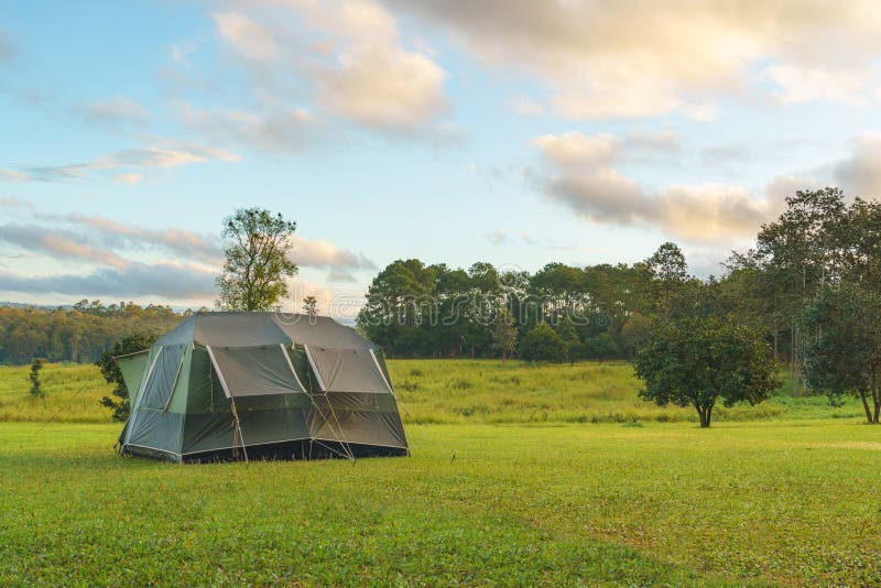 Tourist dome tent camping at forest camping site royalty free stock photography