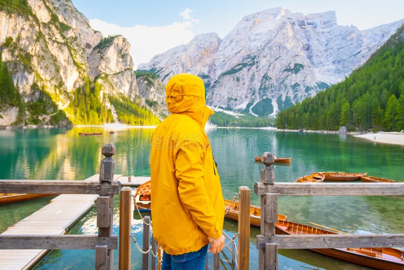 Tourist with Hiking Outfit Enjoying Amazing View of Alpine Lake Braies ...