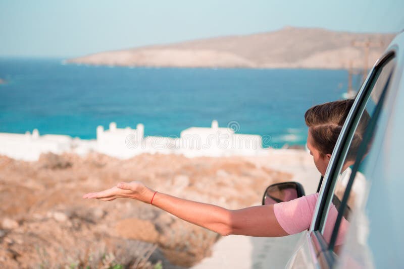 Tourist man on vacation travel by car. Summer holiday and car travel concept.