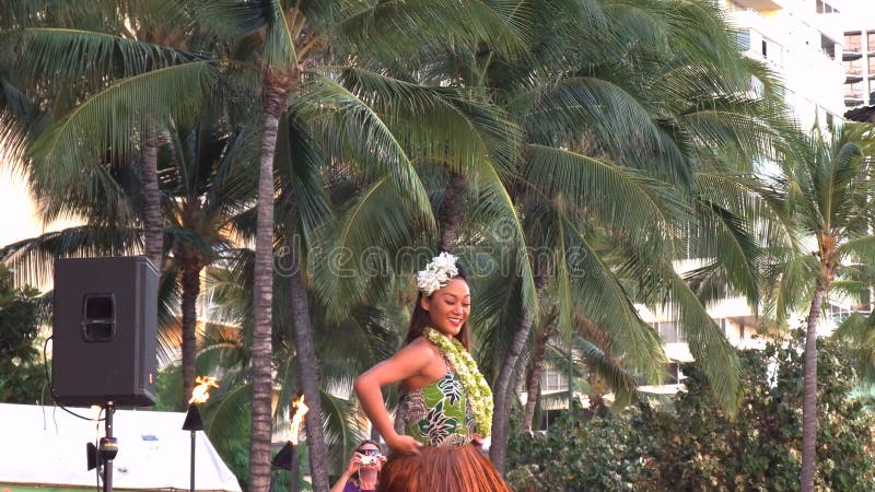 Handsome Male Hula Dancer on the beach at sunset in traditional costume grass  skirt. 14685735 Stock Photo at Vecteezy