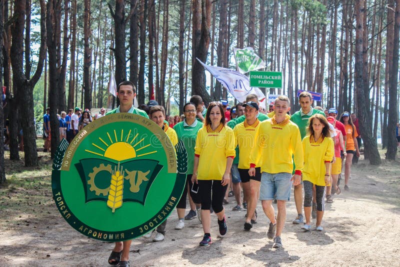 The tourist rally of young people in the Gomel region of the Republic of Belarus. In the Gomel region each year, the tourist gathering where compete teams from all districts of the region. At the event youth teams compete in the tourism job, sports competitions, tug of war, beach volleyball and other disciplines. Each year the forum is held in different areas, in the most picturesque places and lasts about three days, and then summarizes the events and determined the winning team. This shot taken during a summer tourist gathering in 2017.