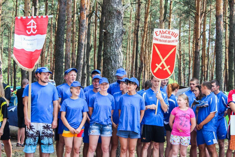 The tourist rally of young people in the Gomel region of the Republic of Belarus. In the Gomel region each year, the tourist gathering where compete teams from all districts of the region. At the event youth teams compete in the tourism job, sports competitions, tug of war, beach volleyball and other disciplines. Each year the forum is held in different areas, in the most picturesque places and lasts about three days, and then summarizes the events and determined the winning team. This shot taken during a summer tourist gathering in 2017.