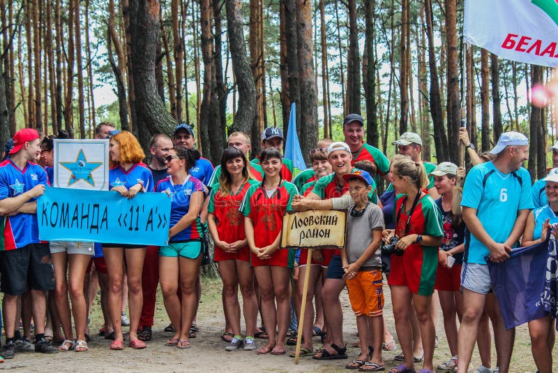 The tourist rally of young people in the Gomel region of the Republic of Belarus. In the Gomel region each year, the tourist gathering where compete teams from all districts of the region. At the event youth teams compete in the tourism job, sports competitions, tug of war, beach volleyball and other disciplines. Each year the forum is held in different areas, in the most picturesque places and lasts about three days, and then summarizes the events and determined the winning team. This shot taken during a summer tourist gathering in 2017.