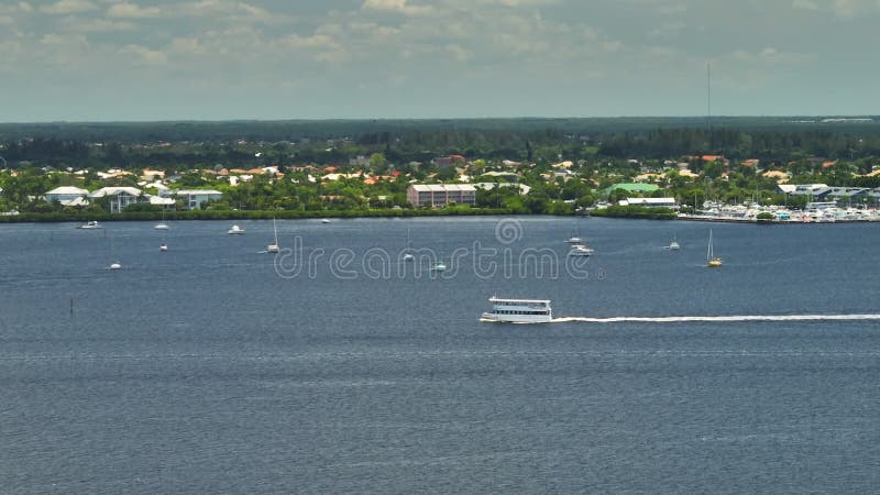 Tourist Sightseeing Boat Swimming On Sea Waves With Ripple Surface Tourist Sightseeing Boat Swimming On Sea Waves With Ripple Surface