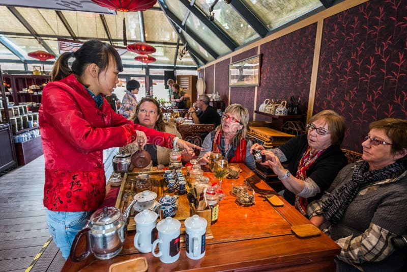 Shanghai, China - April 7, 2013: tourist tasting drinking tea house of Fang Bang Zhong Lu old city at the city of Shanghai in China on april 7th, 2013