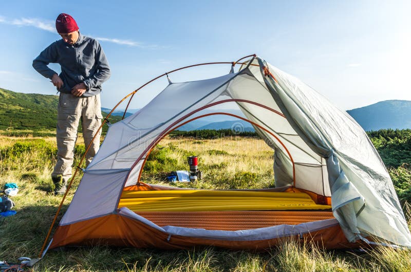 Tourist Tent and Tourist. View of the Landscape through the Tent Stock ...