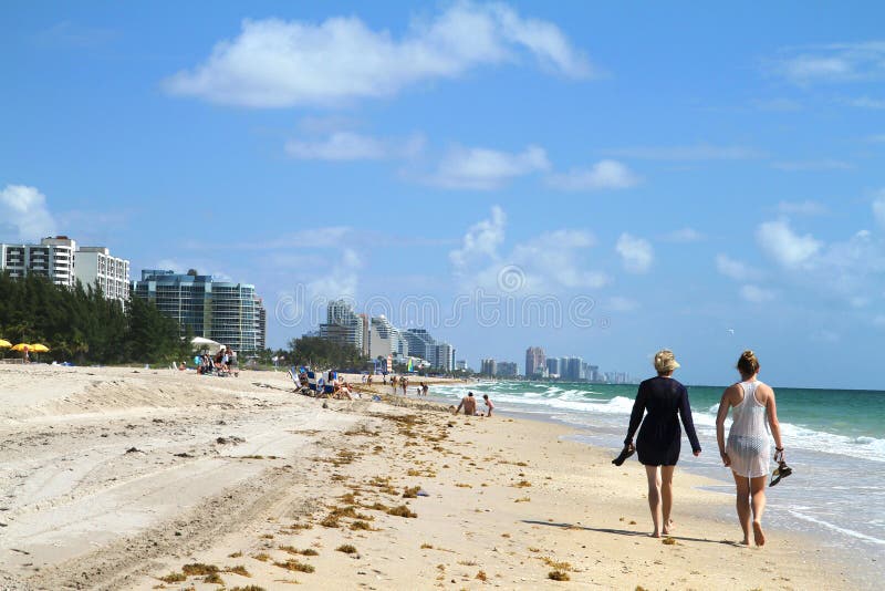 Tourist walking on Fort Lauderdale Beach stock images Tourist walking on Fort Lauderdale Beach stock images