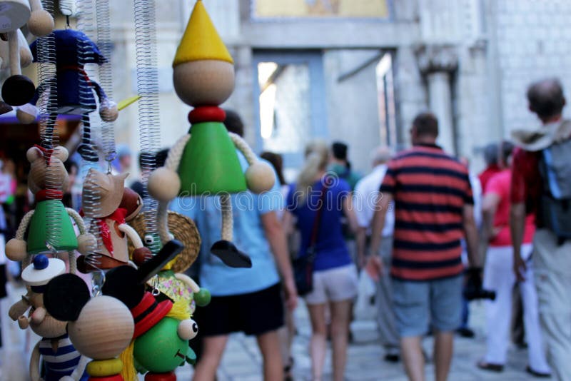 Tourists and souvenirs in the center of Porec, Croatia. Tourists and souvenirs in the center of Porec, Croatia