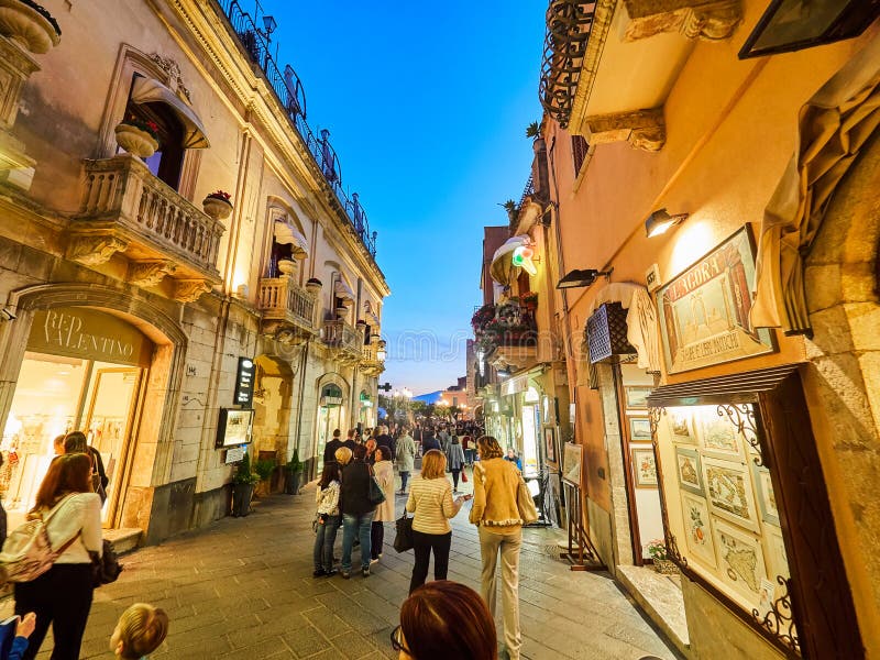 Tourists on the main street in Taormina, Sicily, Italy. Tourists on the main street in Taormina, Sicily, Italy.