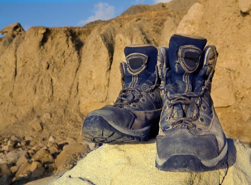 Tourists boots in mountains