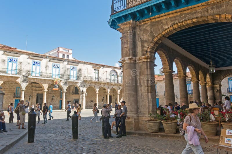 HAVANA, CUBA - JANUARY 16, 2017: Tourists at the Cathedral Square on a beautiful day. Old Havana, Cuba. In this square is the cathedral, the Colonial Art Museum and the Archeology Museum. Cuba