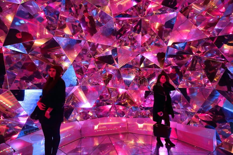 Tourists enjoy Light Origami at Vivid Sydney