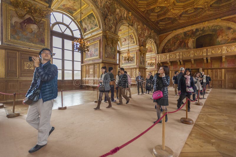 Tourists in Fontainbleau palace