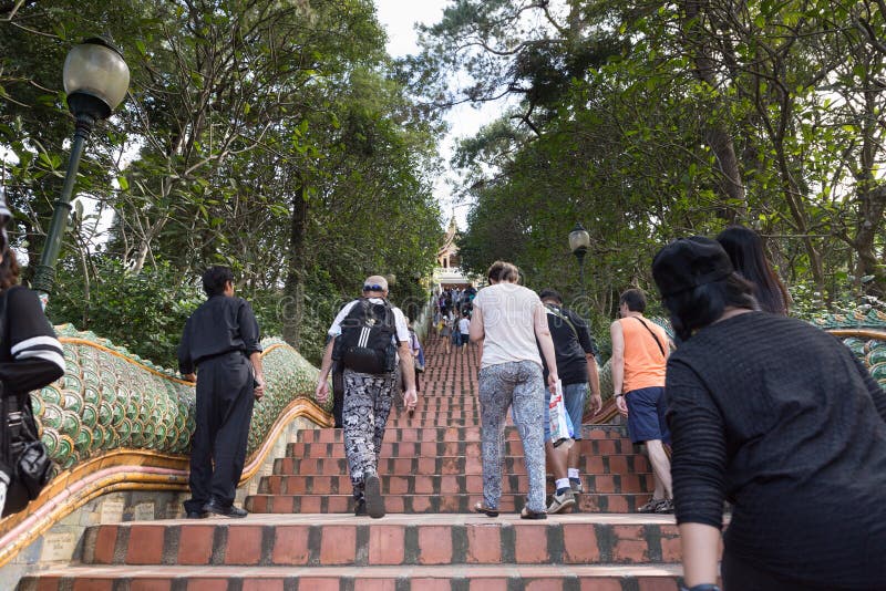 Tourists, foreigner travelers and Thai people walk up stairs to royalty free stock photo Tourists, foreigner travelers and Thai people walk up stairs to royalty free stock photo