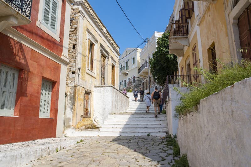 Tourists Going Up and Down on the Steps of Kali Strata on Symi, Greece