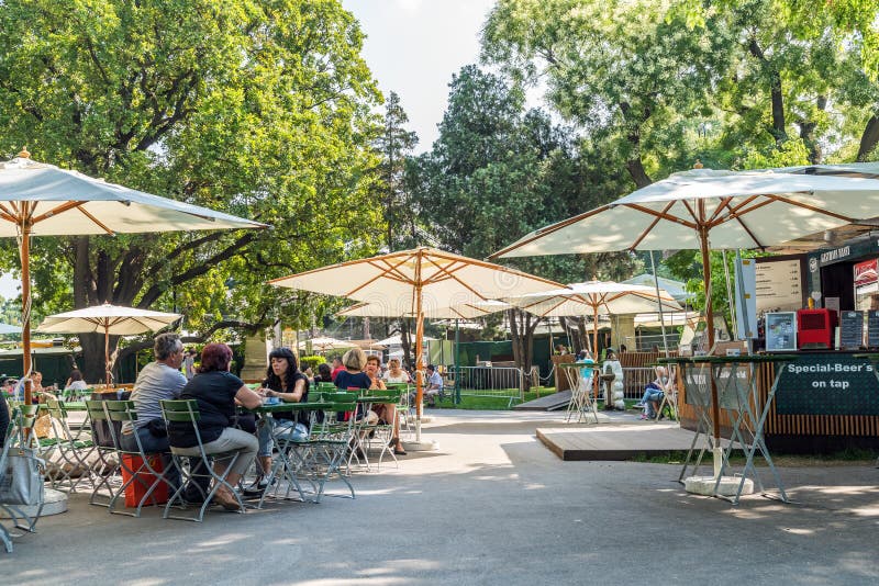 Tourists Having Lunch At Outdoor Restaurant Downtown Vienna City