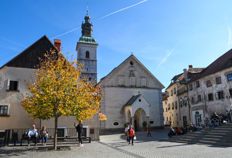 Tourists and locals in the square of Skofja loka, Slovenia