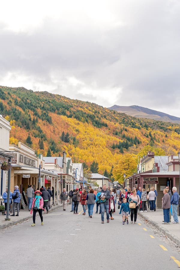 TOURISTS in the MAIN STREET of ARROWTOWN during the AUTUMN FESTIVAL