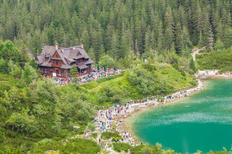 Tourists at mountain chalet royalty free stock image Tourists at mountain chalet royalty free stock image