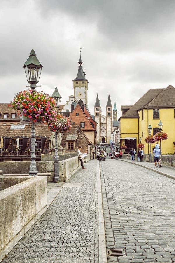 Tourists In Old Town And Cathedral Towers Wurzburg Bavaria Germany