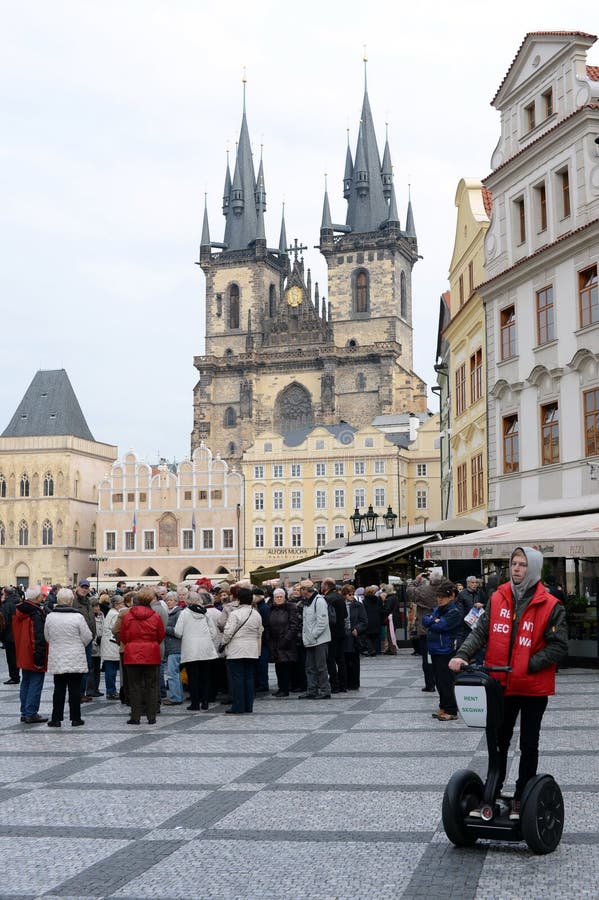 Tourists on Prague`s old town square.