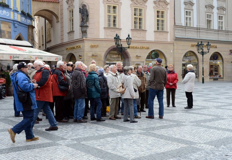 Tourists on Prague`s old town square.