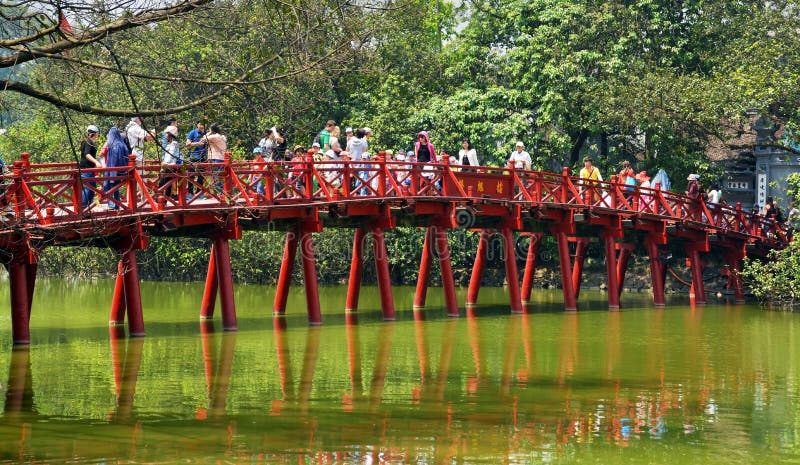 Tourists on Red Bridge Lake Hoan Kiem Hanoi