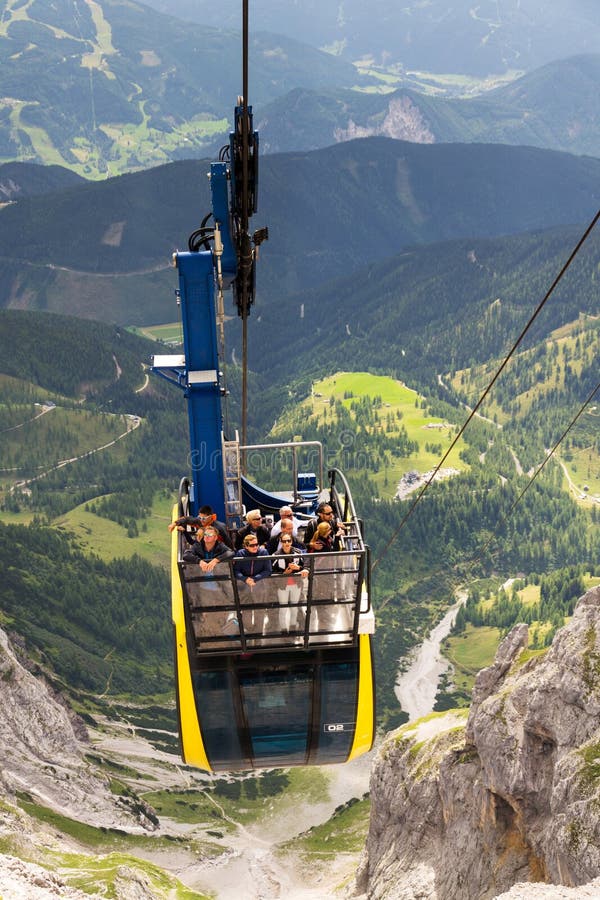 Tourists on top of gondola in the upper station of the Dachstein cable car on August 17, 2017 in Ramsau am Dachstein, Austria.