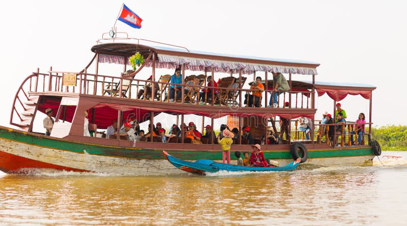 Floating Village On The Tonle Sap Lake In Cambodia And Two 