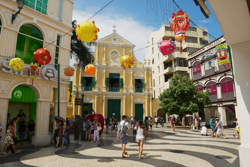 Tourists walk in front of the St. Dominic`s Church in Macau, China. stock photography Tourists walk in front of the St. Dominic`s Church in Macau, China. stock photography