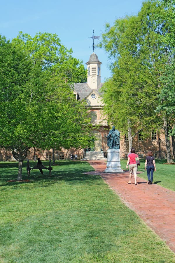Tourists walk towards the Wren building on the William and Mary stock photos Tourists walk towards the Wren building on the William and Mary stock photos