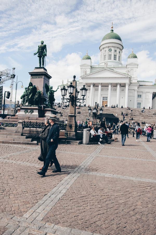 Tourists walking in front of Helsinki cathedral royalty free stock photo Tourists walking in front of Helsinki cathedral royalty free stock photo