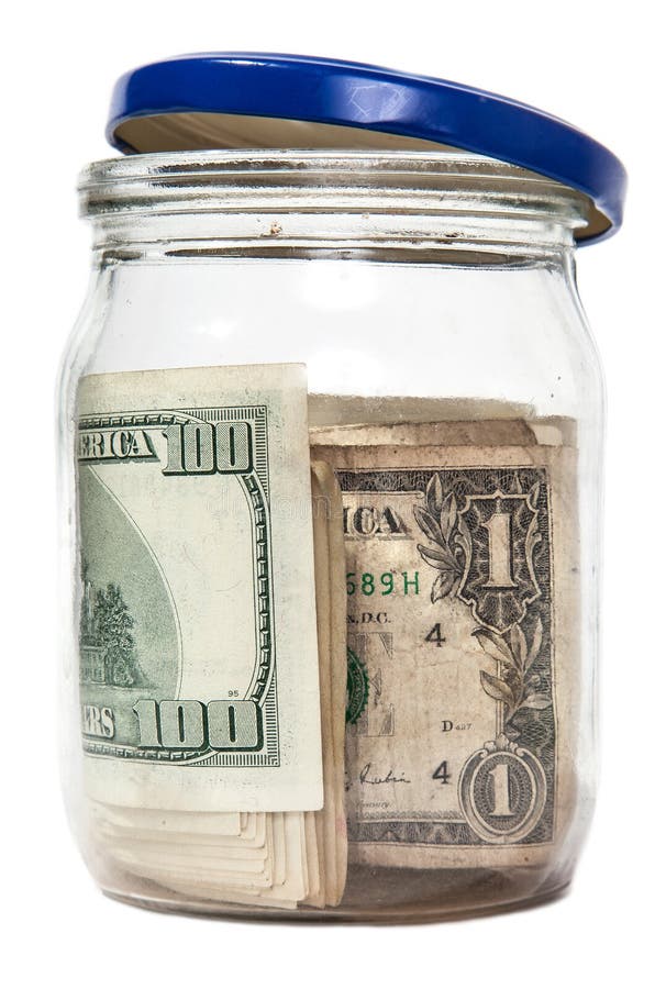 Tout l'argent dans une tirelire isolé photo libre de droits