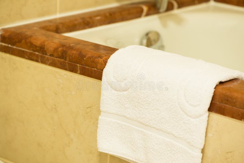 Towel in the bathroom stock image. Image of cloth, design 129945999