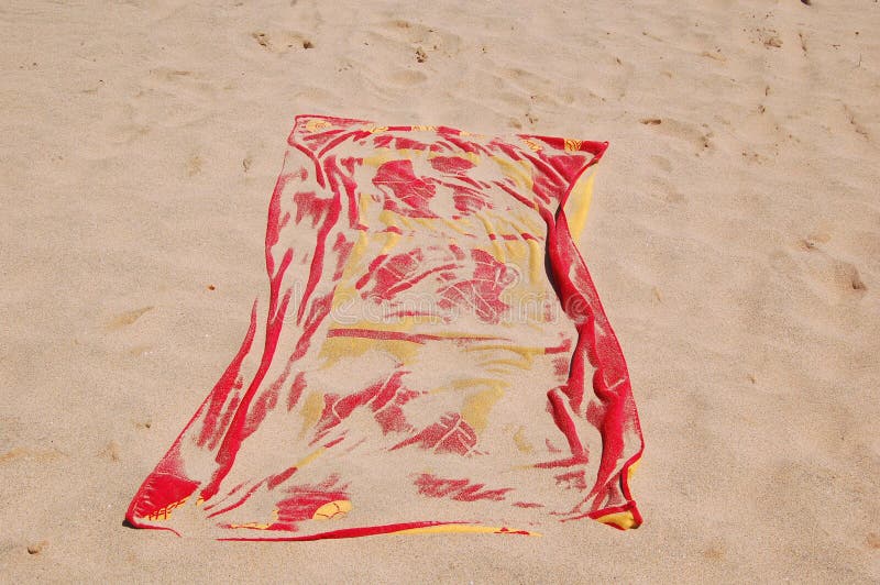Towel on sand beach stock photo. Image of travel, covered 3469486