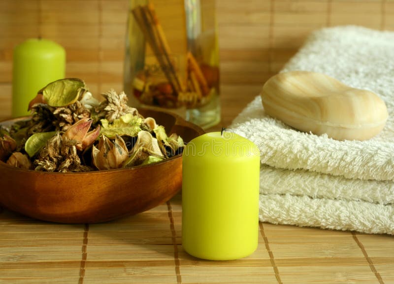 Towel, soap, candle and natural herbal ingredient.