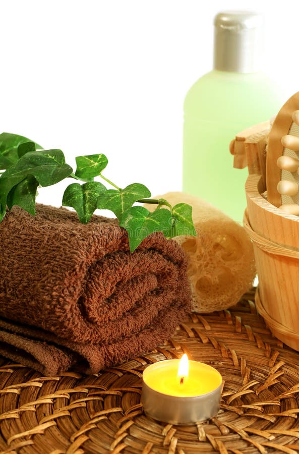 towel, sponge, candle and flowers