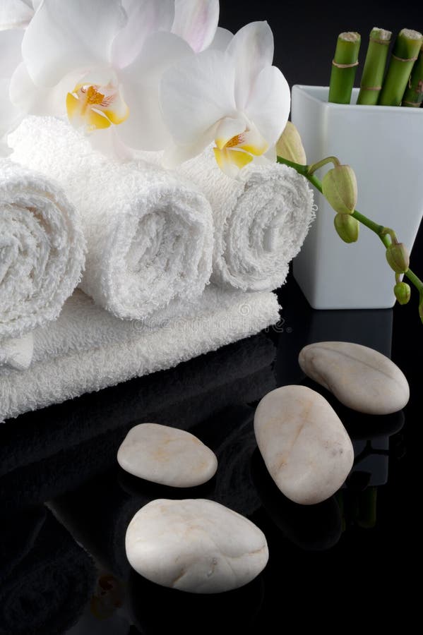 Towels with orchid and stones