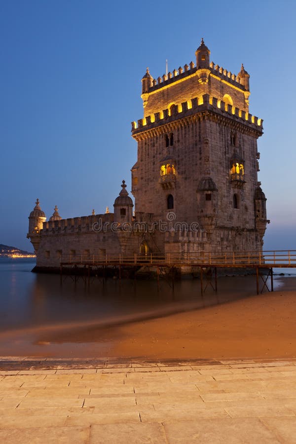 The famous Tower of Belem at Lisbon after sunset, vertical image. The famous Tower of Belem at Lisbon after sunset, vertical image