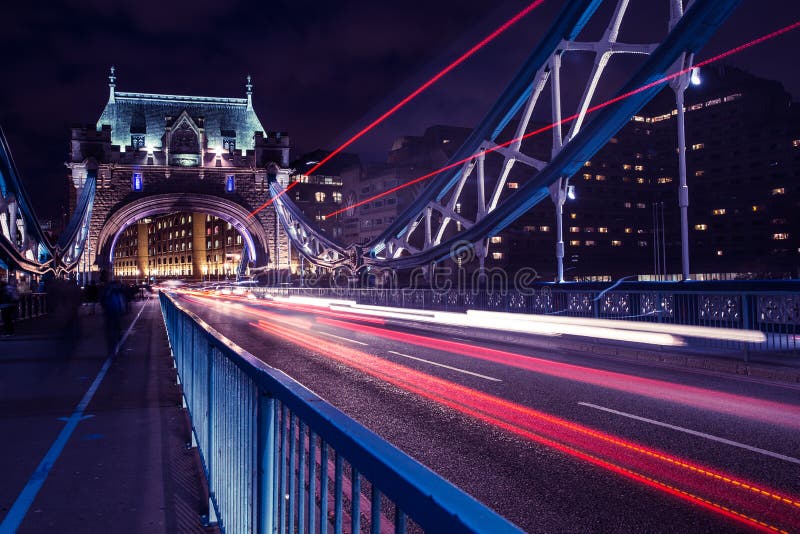Tower Bridge London at night with traffic light trails