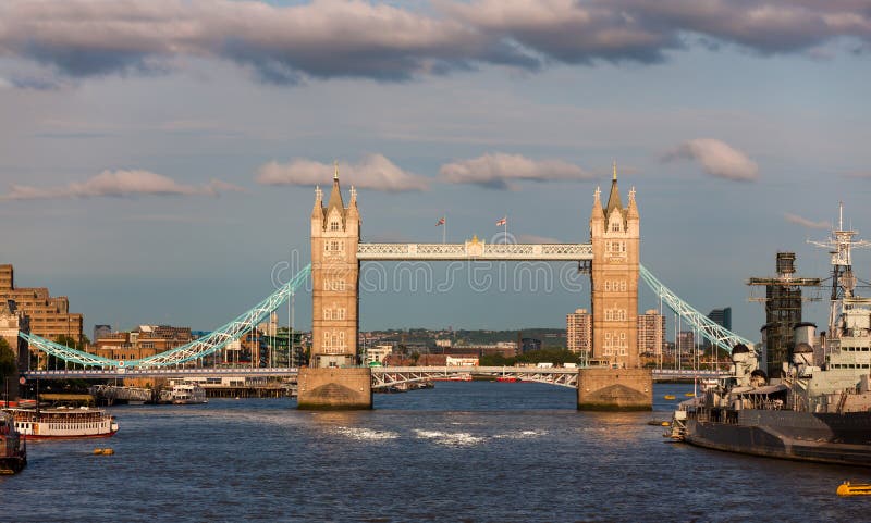 Iconic turreted bridge close to H.M.S. Belfast on right and Tower of London at left. Iconic turreted bridge close to H.M.S. Belfast on right and Tower of London at left