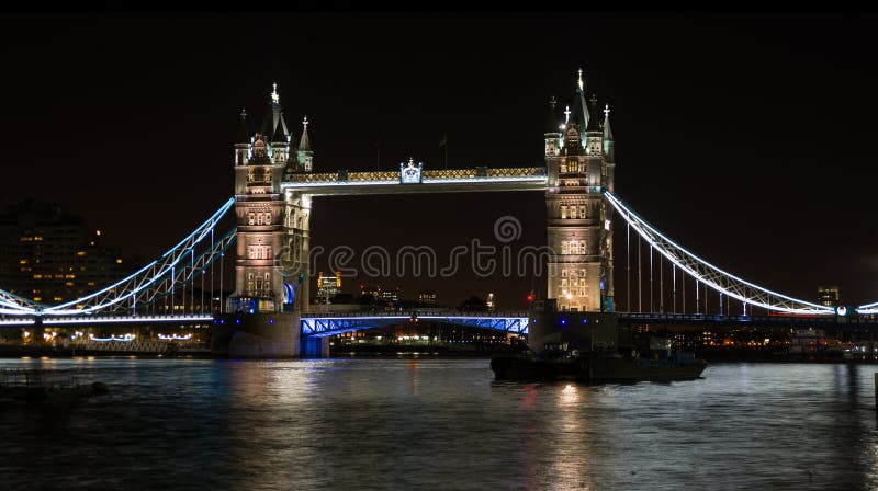 Tower Bridge on River Thames London UK at night