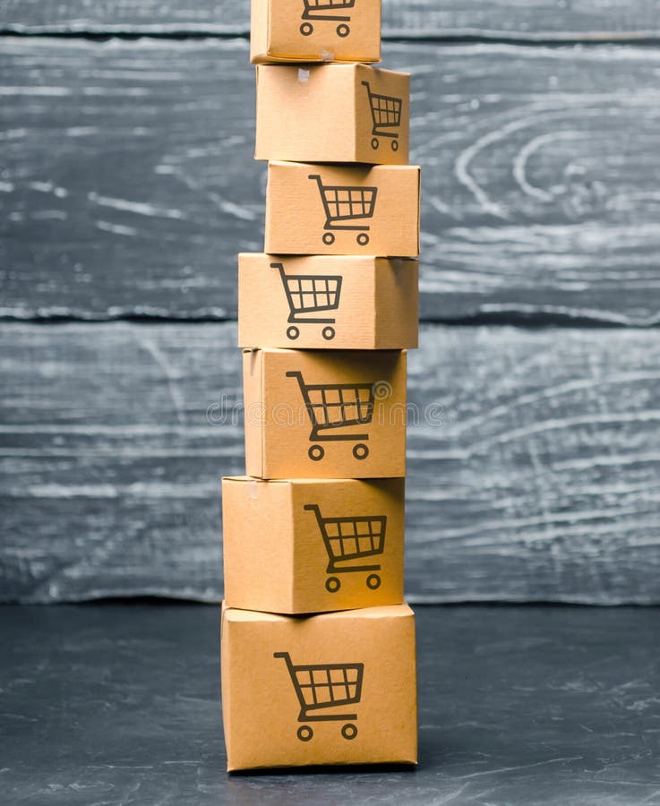 Tower of Cardboard Boxes with Pattern of Shopping Carts on a Blue