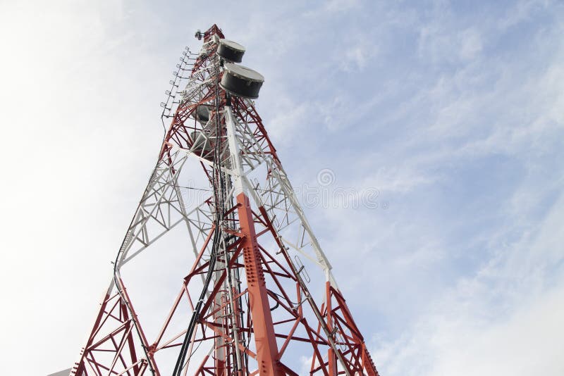 Tower of cellular communication. The tower of cellular communication provides with communication people around royalty free stock photo Tower of cellular communication. The tower of cellular communication provides with communication people around royalty free stock photo