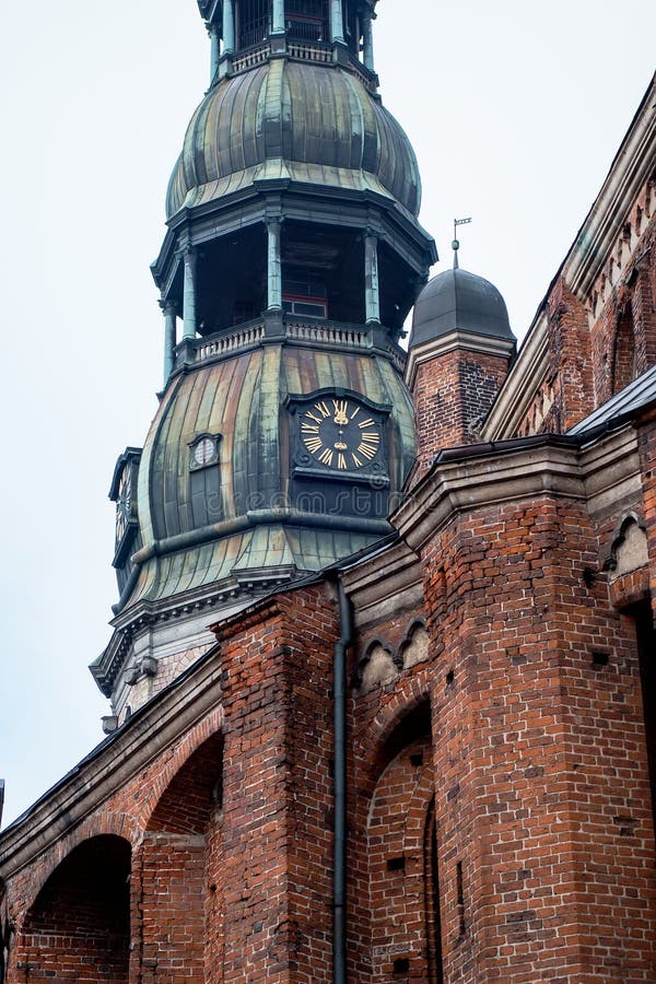 Tower clock of the famous St. Peter Church, Old town, Riga, Latvia