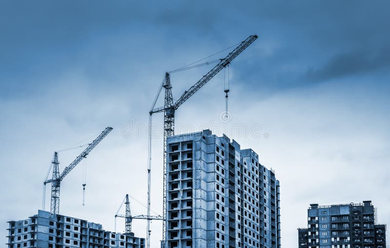 Tower cranes and buildings under construction