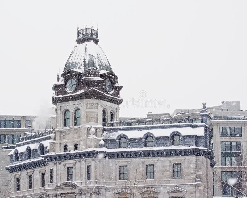 Tower of the neogothic building of the Old port corporation of Montreal in winter