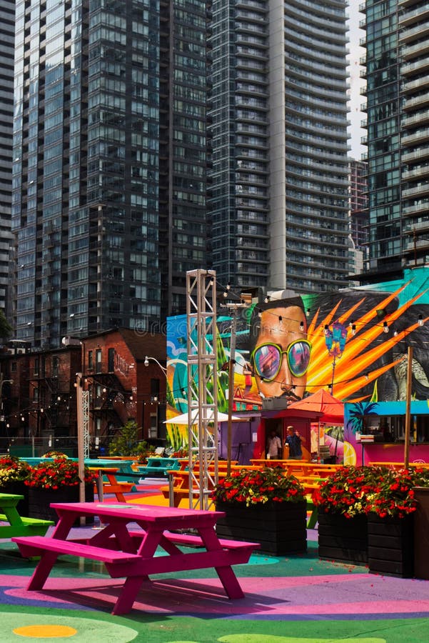 Towering condos are a contrast to the bold mural colors, Toronto, Canada