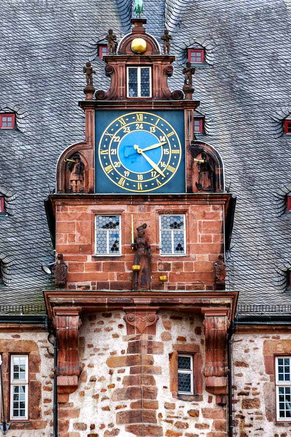 Town Hall renaissance tower with the clock gable in university town of Marburg, Hesse, Germany. Town Hall renaissance tower with the clock gable in university town of Marburg, Hesse, Germany