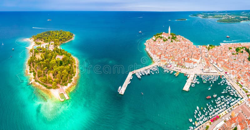 Town of Rovinj historic peninsula and Sveta Katarina island aerial view